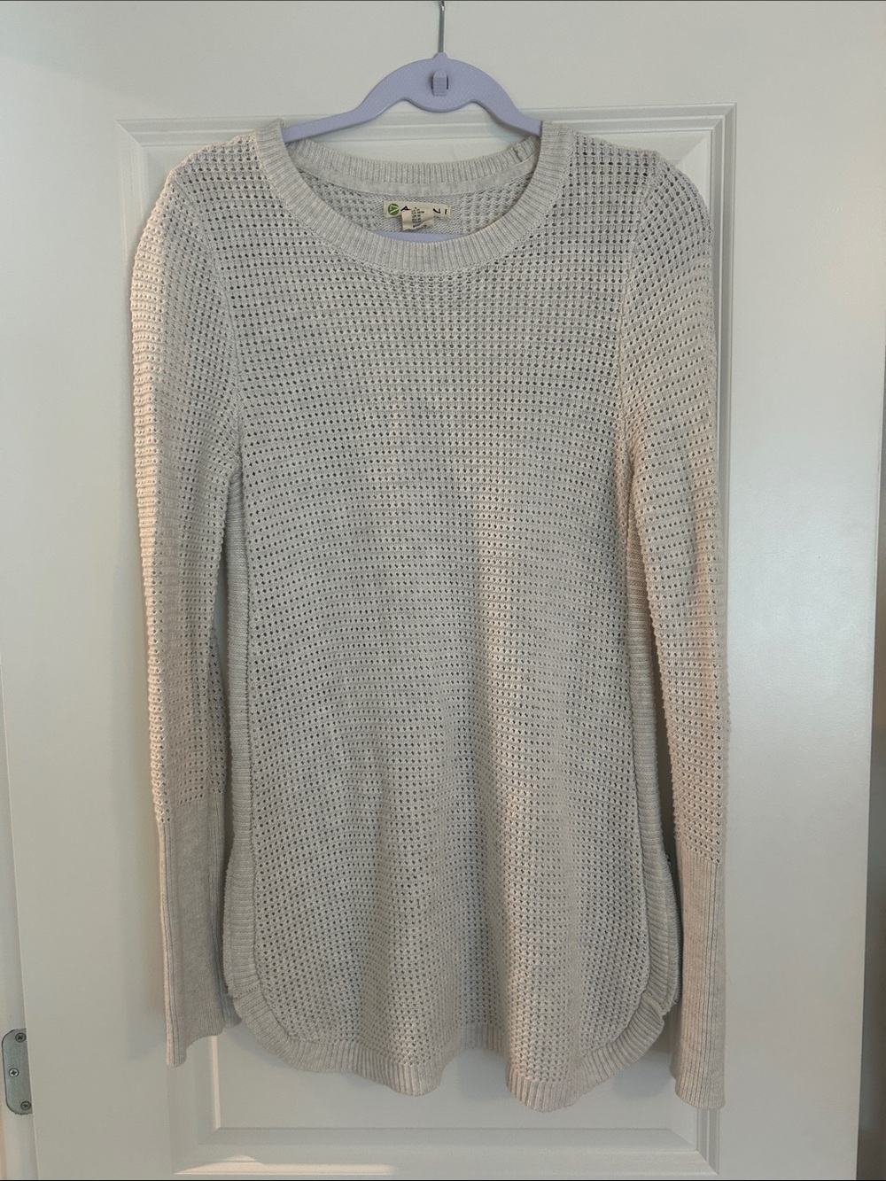 Dakini Cream Open-Knit Crewneck Sweater with side zippers